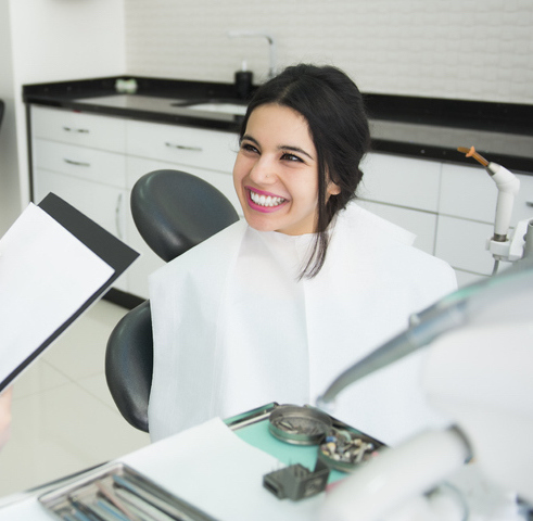smiling woman at doctors office