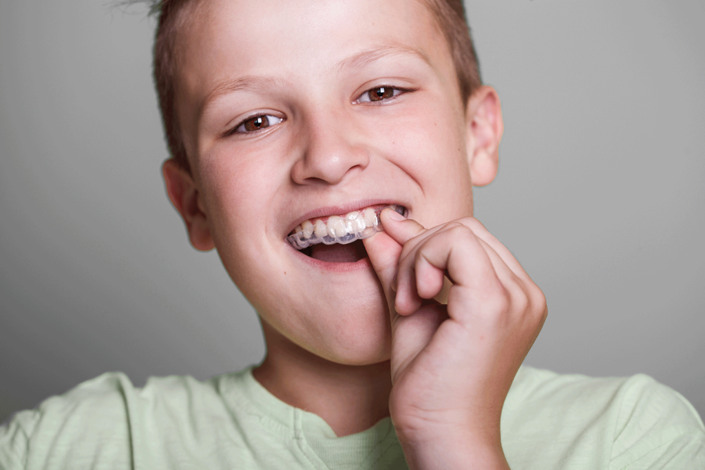 teen with Invisalign